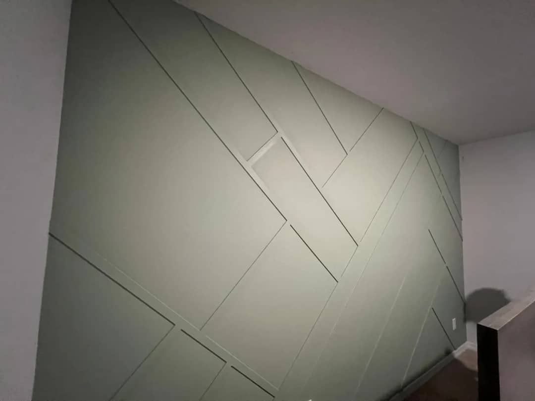 Sage green geometric wall detail